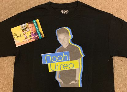 Black T-shirt and signed card featuring Noah Urrea's image and name.