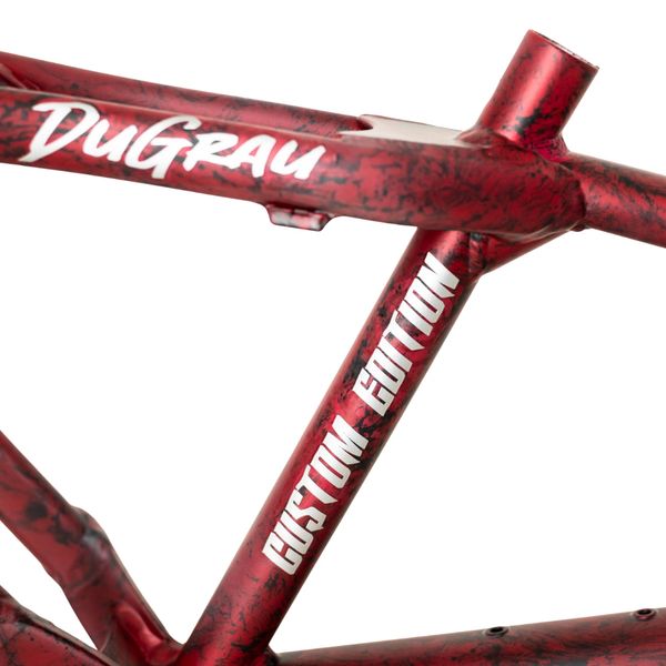 Close-up of a red DuGrau custom edition bicycle frame with detailed paint.