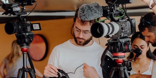 Man operating a camera