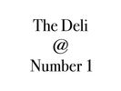 Sign reading 'The Deli @ Number 1' in black text on white background.
