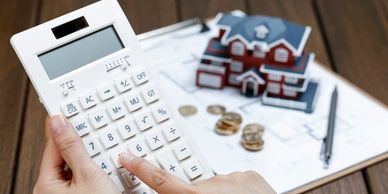 Calculating the costs of your monthly mortgage payments. 