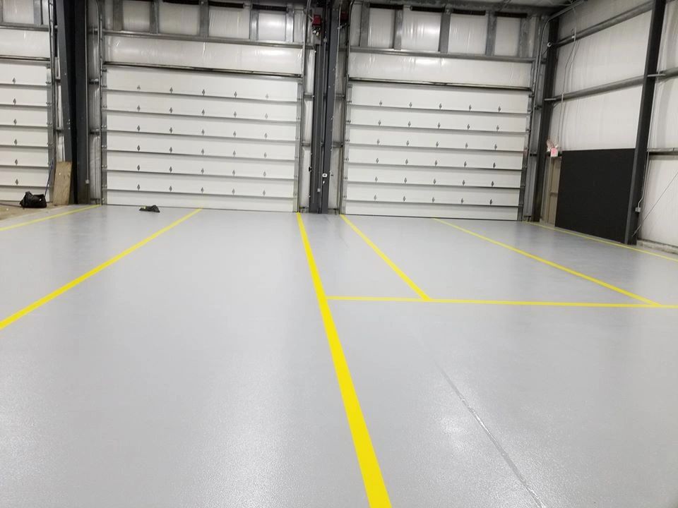 Epoxy coated dealership with safety lines