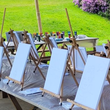 blank canvasses set up ready to start a painting workshop with lemonade events.