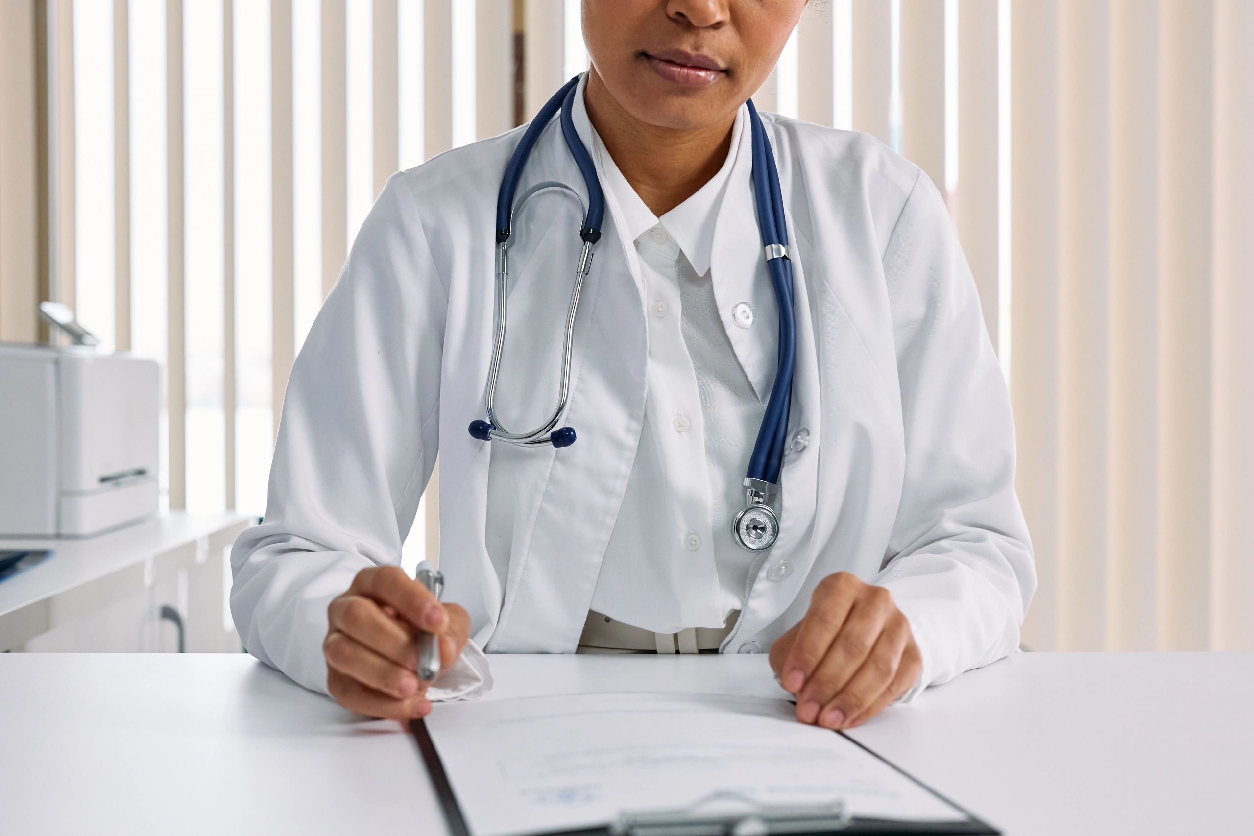 Doctor reviewing a medical chart.