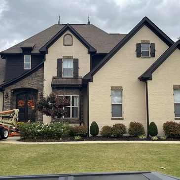 Exterior brick and trim painted.