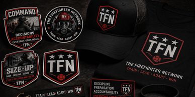 Firefighter Network patches and hats displaying motivational phrases and logos.
