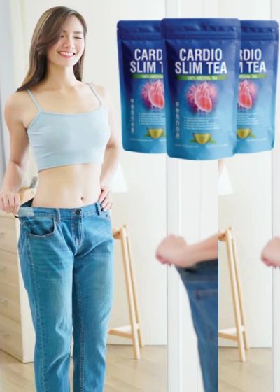 Woman showing loose jeans next to slimming tea packs.