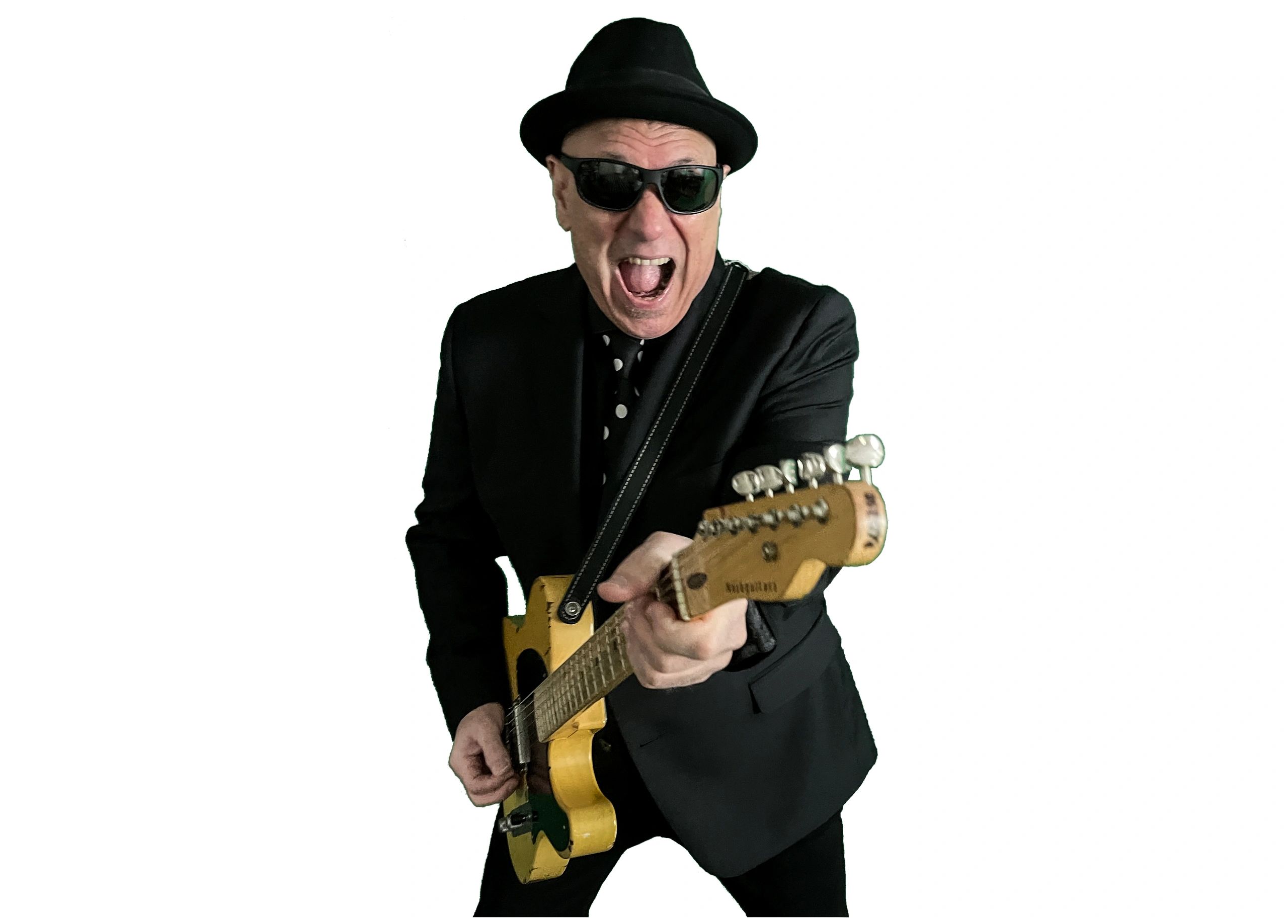 Man in black suit and hat playing electric guitar.