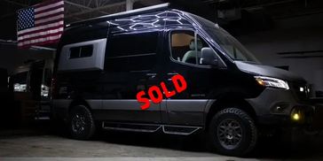 Exterior view of Rebyl Vans custom Outside model Mercedes-Benz Sprinter in MN.