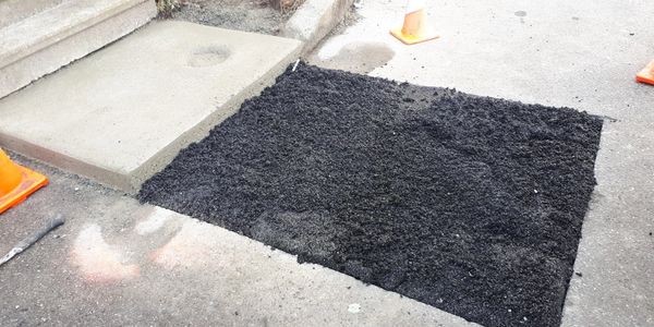 Pavement, cut and patching.