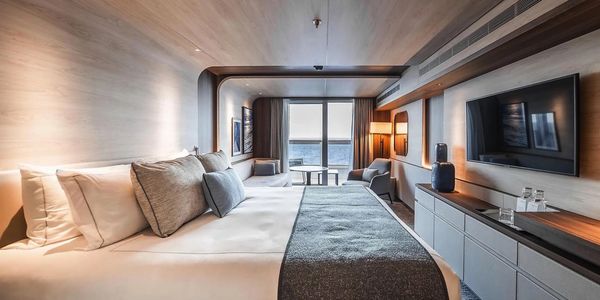 Modern hotel room with ocean view.