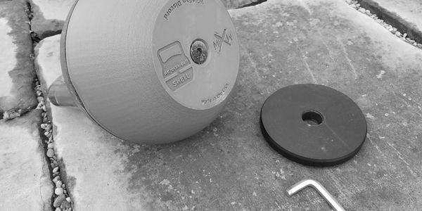 Adjustable kettlebell shell installed