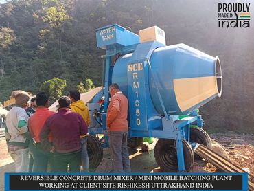 REVERSIBLE CONCRETE DRUM MIXER / MINI MOBILE BATCHING PLANT WORKING AT CLIENT SITE IN RISHIKESH