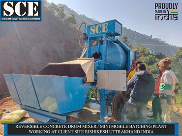 REVERSIBLE CONCRETE DRUM MIXER / MINI MOBILE BATCHING PLANT WORKING AT CLIENT SITE IN RISHIKESH