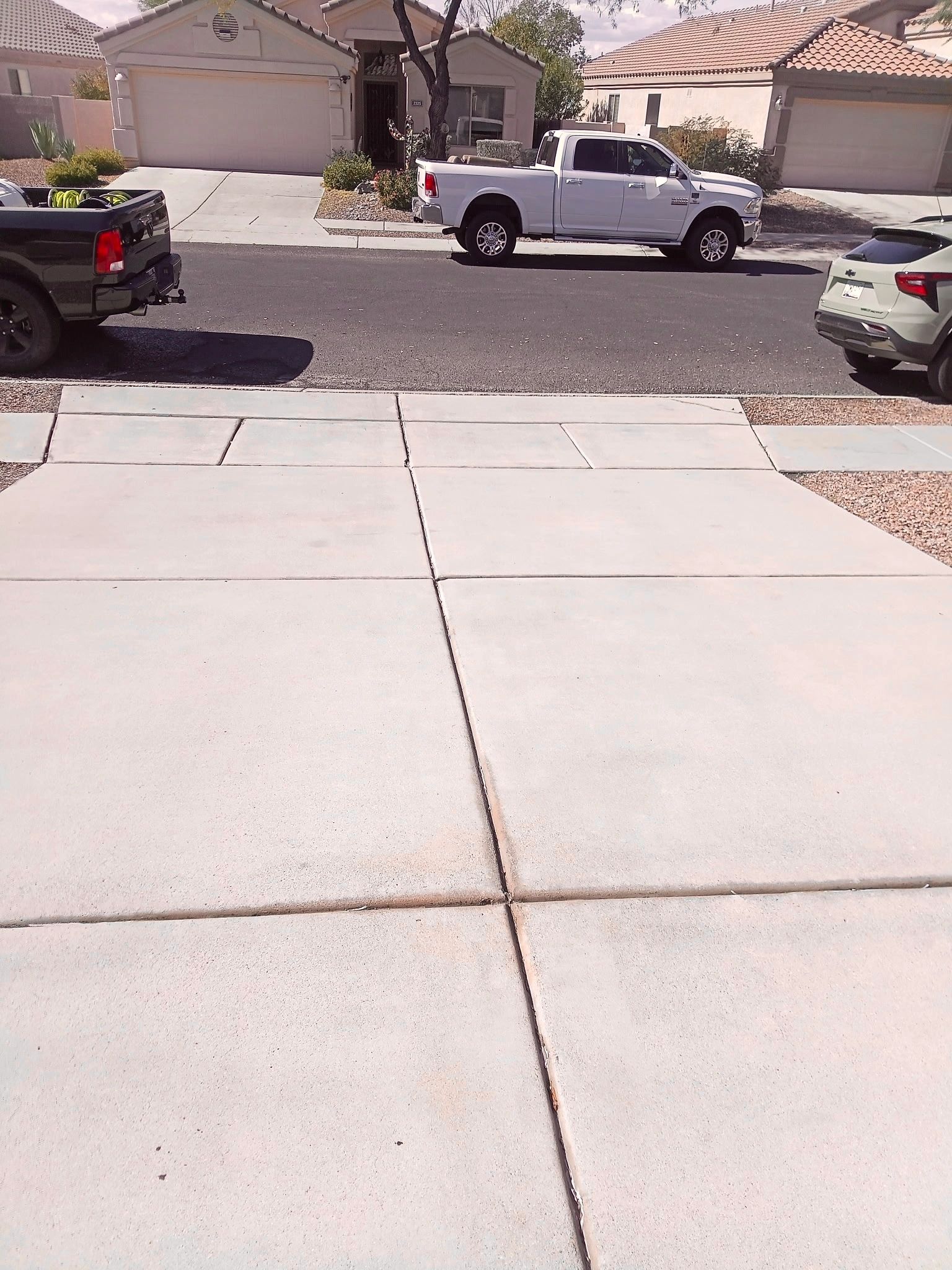 Clean, bright driveway showcasing results of Skyros Pressure Washing service.
