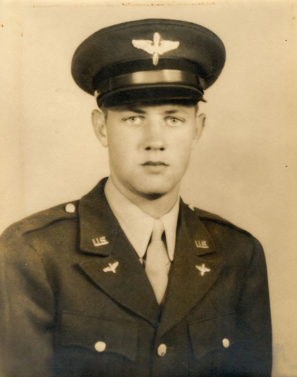 Military officer in formal uniform.
