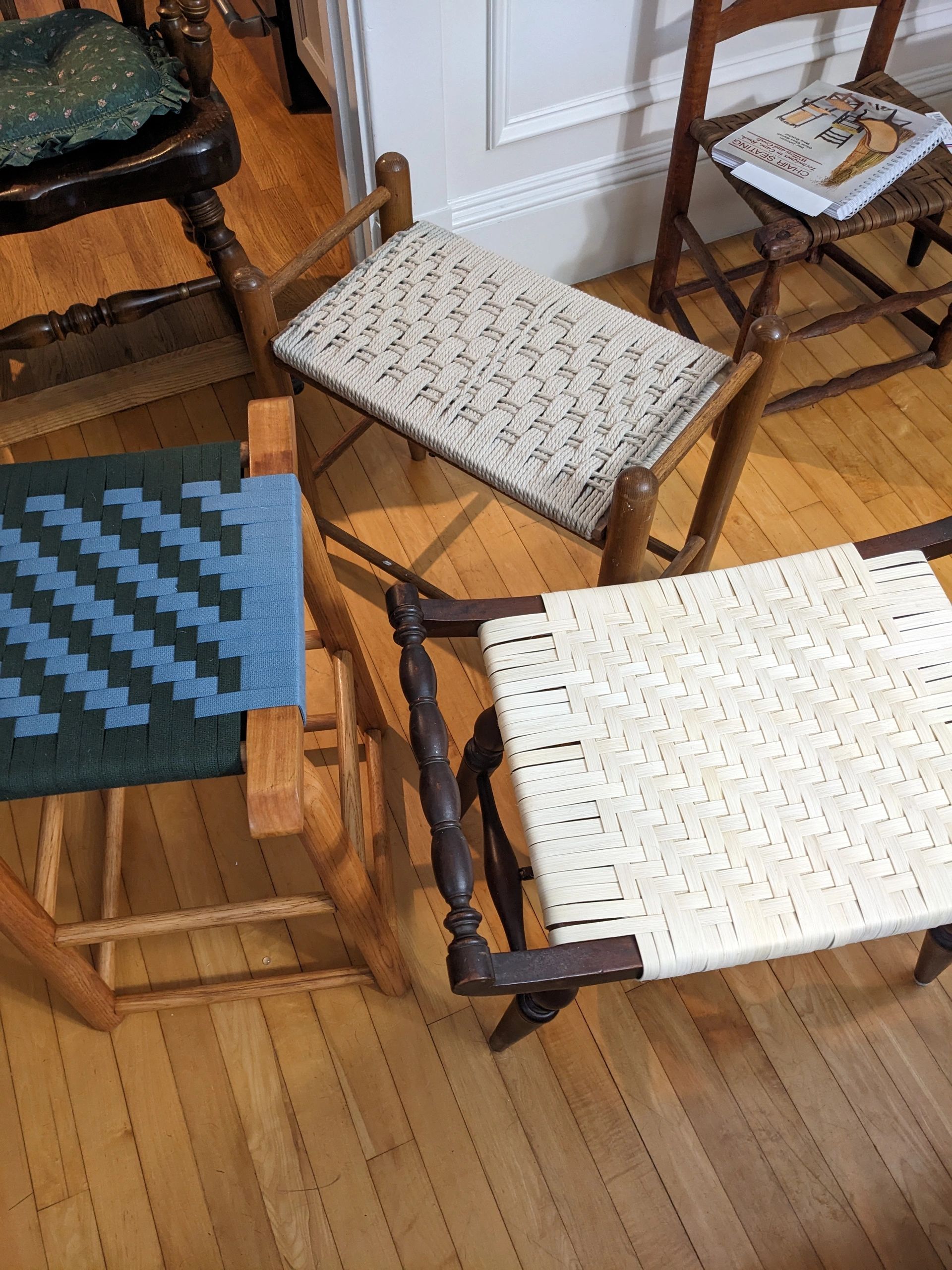 Stools redone in a class using Shaker Tape, flat reed and cord