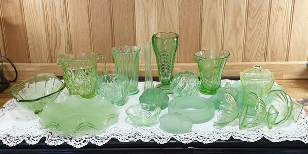 Collection of vintage glass bowls, vases and lidded pots.