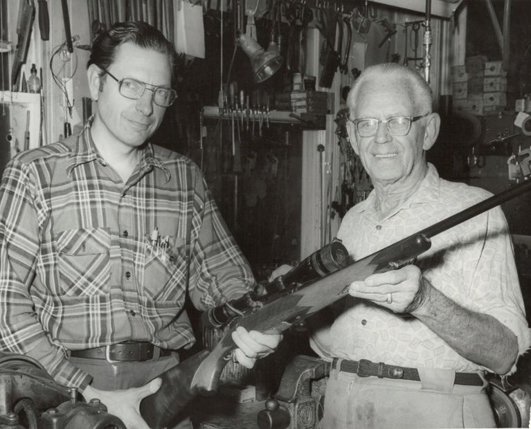 Cal Will & Harold (Unk) Will displaying a recently completed, sporterized 1903 Springfield rifle.