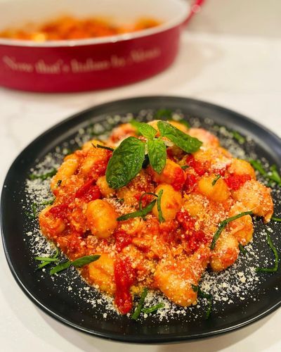 CHEESY BAKED GNOCCHI WITH A ROASTED GARLIC TOMATO SAUCE