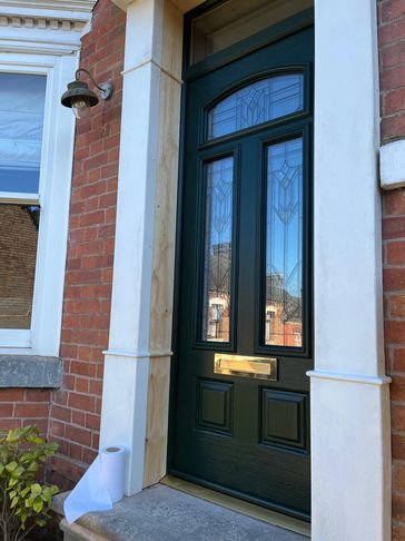 Victorian style composite door with gold hardware