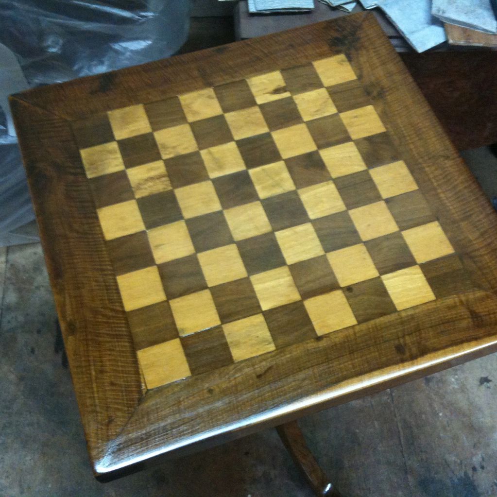 An Olive wood chess table. 