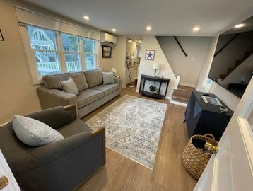 Cozy living room with neutral tones and modern decor.