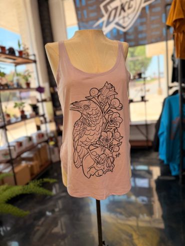 Pink tank top with a detailed bird and flower design.