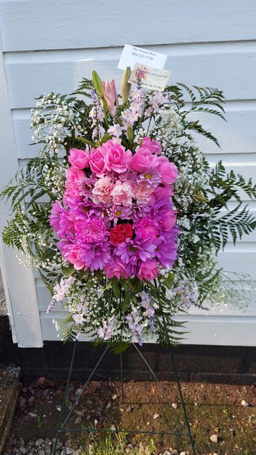 Standing spray live/ artificial flowers $75.00
