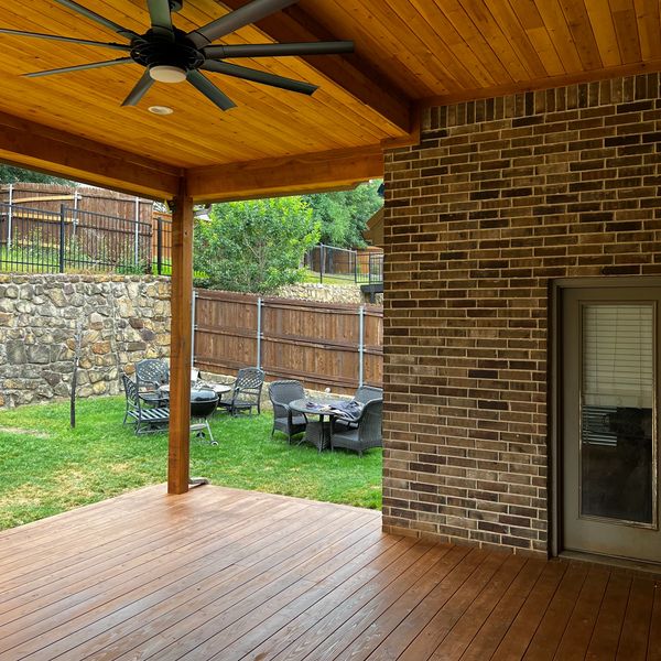 Rear attached cedar pergola.