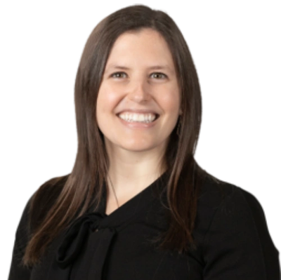 Smiling woman with long brown hair in a black top.