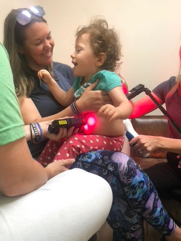 CP warrior getting laser therapy