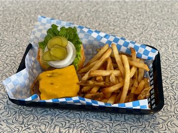 Fresh cheeseburger with fries and all the fixins