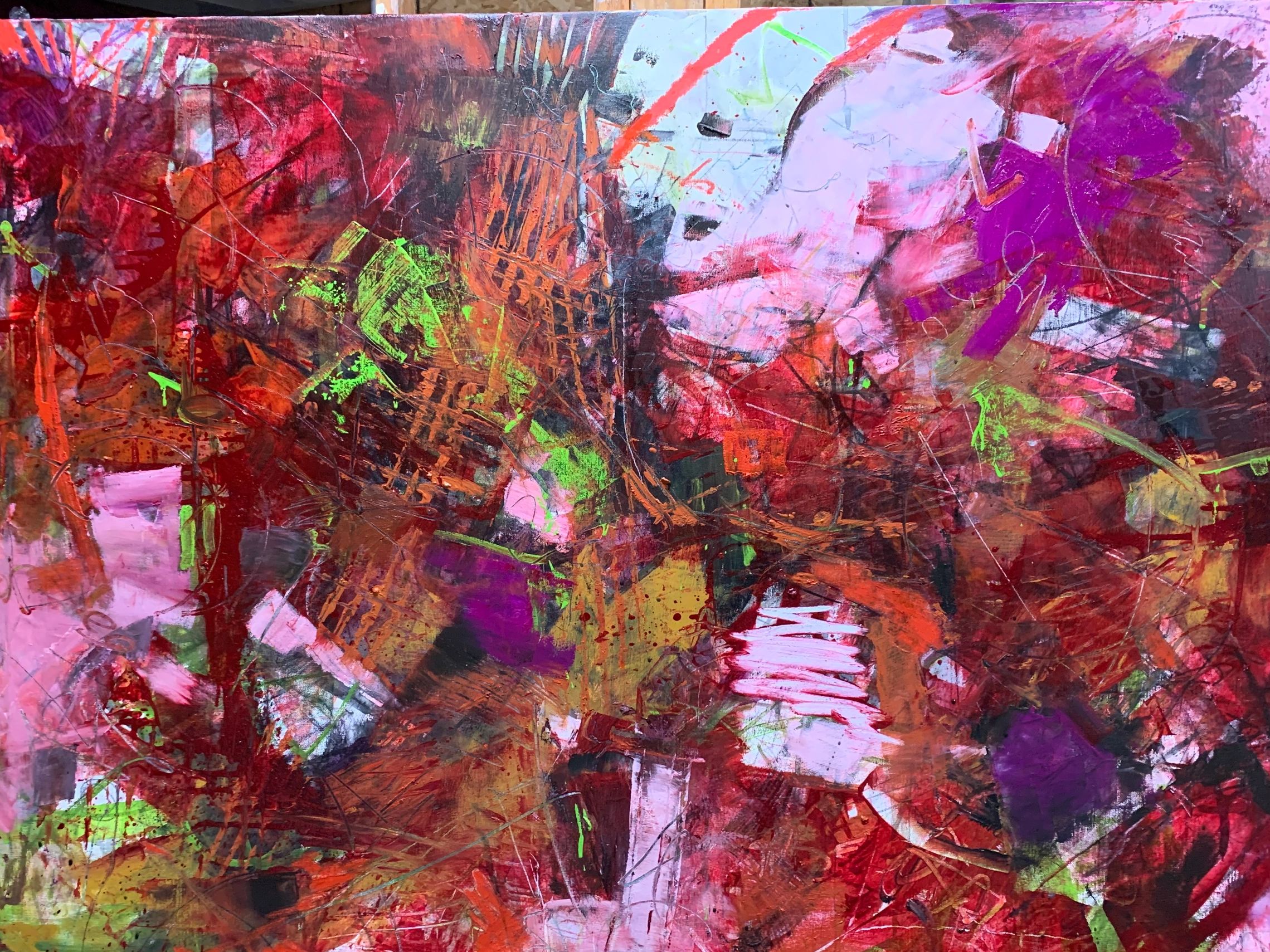 Hot pinks and reds interlaced with lime green lines.