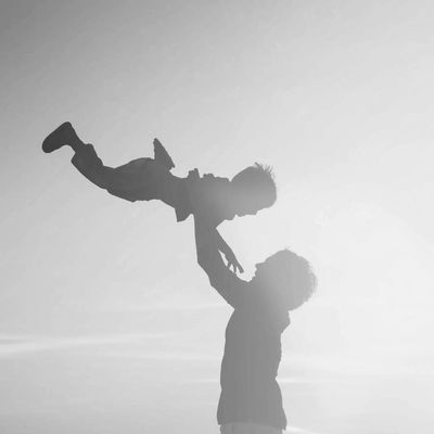 Parent and child playing outside