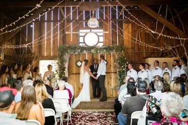 bride and groom holding each others hands 