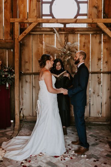 bride and groom looking at each other 