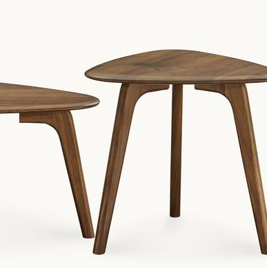 Two wooden tables with rounded triangular tops and three legs each.