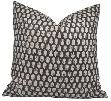 Black and white patterned decorative pillow.