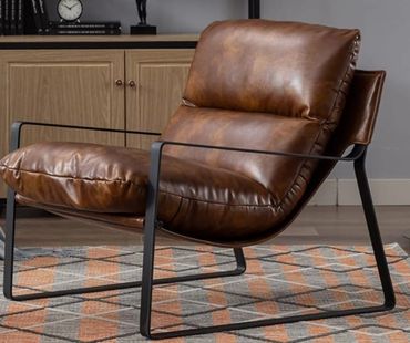 Brown leather chair with black metal frame.