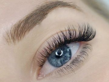 Hybrid eyelash extensions  Stock Photo