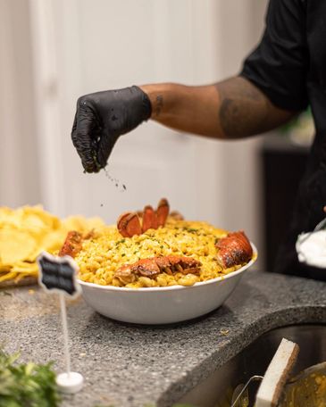 Indulge in our decadent lobster mac and cheese, a crowd-pleasing dish that's perfect for any event