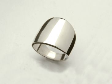 A shiny silver ring with a smooth, rounded surface.