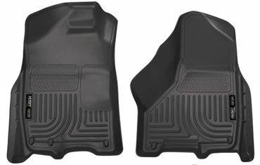 Two black automotive floor mats with raised edges and textured surfaces.