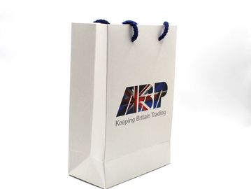 White shopping bag with UK flag design and slogan.