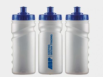 Three white water bottles with blue caps and a trading company logo.