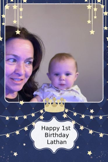 A woman and baby celebrating Lathan's 1st birthday with a starry theme.