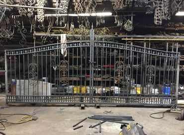 worker making metal decorative door