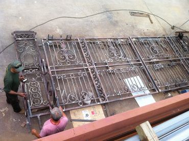 men making metal decorative door