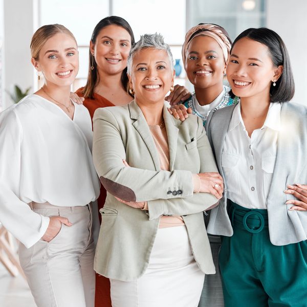 Diverse group of professional women supporting each other in retirement planning